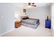 Cozy bedroom featuring a ceiling fan, soft carpet, and a playful basketball hoop for added fun at 6910 Birdsong Ln, Waxhaw, NC 28173