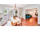 Breakfast nook with natural lighting and direct access to the outdoor living space at 6910 Birdsong Ln, Waxhaw, NC 28173