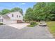 Exterior view with large garage, patio and beautiful landscaping at 6910 Birdsong Ln, Waxhaw, NC 28173