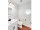 Bathroom featuring updated vanity, toilet, fixtures, and flooring at 6910 Birdsong Ln, Waxhaw, NC 28173