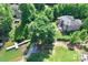 The home has a gorgeous backyard with lake access, a private dock, and a cozy fire pit at 7365 Gabriel St, Sherrills Ford, NC 28673