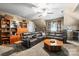 Large bonus room with home entertainment setup, featuring comfortable leather seating at 7365 Gabriel St, Sherrills Ford, NC 28673