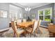 Formal dining room with a wood table, chandelier, and natural light at 7365 Gabriel St, Sherrills Ford, NC 28673
