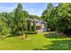 Brick two-story home with mature landscaping and a well-manicured lawn at 7365 Gabriel St, Sherrills Ford, NC 28673