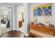 Hallway with hardwood floors, decorative console, and views to other rooms at 7365 Gabriel St, Sherrills Ford, NC 28673