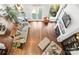 Spacious living room featuring hardwood floors, fireplace, and large windows bringing in plenty of natural light at 7365 Gabriel St, Sherrills Ford, NC 28673