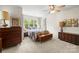 Large bedroom with natural light, wood accents, and vintage dressers at 7365 Gabriel St, Sherrills Ford, NC 28673