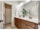 Bathroom featuring double sinks, modern fixtures, and a clean, bright aesthetic for a refreshing experience at 801 Hidden Pond Ln, Waxhaw, NC 28173