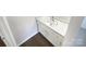Bathroom featuring modern vanity with countertop sink and white cabinets at 8049 Regent Park Ln, Charlotte, NC 28210