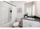 Clean bathroom features a shower-tub combo, modern vanity with a white color palette at 8118 Jacey Ln # 21, Huntersville, NC 28078