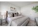 Serene main bedroom featuring neutral decor, ample natural light, and comfortable, stylish furnishings at 8118 Jacey Ln # 21, Huntersville, NC 28078