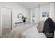 Calm main bedroom offering neutral tones, walk-in closet and natural light through large windows at 8118 Jacey Ln # 21, Huntersville, NC 28078