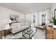 Cozy living room filled with modern decor, wood floors, and soft natural lighting at 8118 Jacey Ln # 21, Huntersville, NC 28078