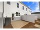 Outdoor patio area with white fence, air conditioning unit, and access to the home at 8118 Jacey Ln # 21, Huntersville, NC 28078