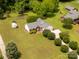 Wide aerial perspective of a lovely home surrounded by manicured lawns and established greenery at 819 Riddle Mill Rd, Clover, SC 29710