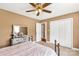Bedroom features a large mirror dresser, ceiling fan, and a closet at 819 Riddle Mill Rd, Clover, SC 29710