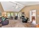 Spacious living room with a fireplace, vaulted ceilings, and comfortable seating area at 819 Riddle Mill Rd, Clover, SC 29710