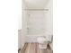 Clean bathroom featuring a shower-tub combination, toilet, and vinyl flooring at 819 W Rankin Ave, Gastonia, NC 28052
