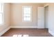 Well-lit bedroom featuring carpet and window, with natural light at 819 W Rankin Ave, Gastonia, NC 28052