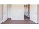 Neutral-toned bedroom featuring carpet, closet, and an entry way at 819 W Rankin Ave, Gastonia, NC 28052