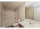This bathroom boasts a shower over tub, a single vanity, and a large mirror at 838 Von Buren Blvd, Rock Hill, SC 29730