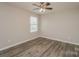 This bedroom has a ceiling fan, LVP floors and good natural light at 838 Von Buren Blvd, Rock Hill, SC 29730
