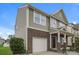 A two-story home with a combination of brick and vinyl siding and an attached garage at 838 Von Buren Blvd, Rock Hill, SC 29730