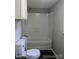 Neutral bathroom featuring a tiled shower-tub and modern fixtures at 874 Old Home Place Way, Lincolnton, NC 28092
