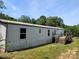 Home exterior featuring a wooden deck at 874 Old Home Place Way, Lincolnton, NC 28092