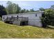 Home exterior featuring a wooden deck at 874 Old Home Place Way, Lincolnton, NC 28092