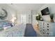 Serene bedroom with ensuite bathroom, stylish furnishings, and soothing color palette, creating a peaceful retreat at 9003 Smokey Hill Ln, Fort Mill, SC 29707