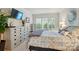 Bedroom with large bed, neutral decor, and bright windows providing natural light at 9003 Smokey Hill Ln, Fort Mill, SC 29707