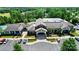 Aerial view of clubhouse with parking, landscaping, and architectural design at 9003 Smokey Hill Ln, Fort Mill, SC 29707