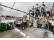 Spacious garage with ample storage solutions, and a golf cart for your recreational needs at 9735 Wheatfield Rd, Charlotte, NC 28277