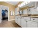 Bathroom with white cabinets, dual sinks, and plenty of storage at 9735 Wheatfield Rd, Charlotte, NC 28277