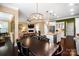 Open-concept layout with a modern kitchen, dining area, and living room with fireplace, great for entertaining at 9735 Wheatfield Rd, Charlotte, NC 28277