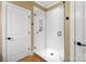 Modern bathroom with tiled shower and glass door at 9735 Wheatfield Rd, Charlotte, NC 28277