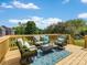 Spacious back deck with comfortable seating, ideal for outdoor living and enjoying the view at 9923 Paradise Ridge Rd, Charlotte, NC 28277