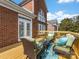 Inviting back deck with outdoor seating, perfect for relaxation and entertaining guests at 9923 Paradise Ridge Rd, Charlotte, NC 28277