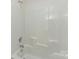 Clean tiled shower and bathtub area at 9923 Paradise Ridge Rd, Charlotte, NC 28277