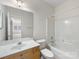 Bright bathroom with a vanity, and shower tub at 9923 Paradise Ridge Rd, Charlotte, NC 28277