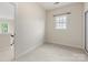 Cozy bedroom filled with natural light has plush carpeting and a closet at 9923 Paradise Ridge Rd, Charlotte, NC 28277