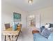 This home office has a desk, seating, and art on the wall at 9923 Paradise Ridge Rd, Charlotte, NC 28277