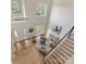 An airy living room with hardwood floors, and a dramatic light fixture at 9923 Paradise Ridge Rd, Charlotte, NC 28277