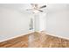 Comfortable bedroom with a ceiling fan, window, and closet space to maximize storage at 10200 Cairnsmore Pl # 9, Mint Hill, NC 28227