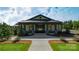 Exterior view of the community clubhouse showcasing stone accents and a covered entrance at 1023 Hostler Ln, York, SC 29745