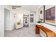 Bright hallway features a decorative shelf with a comfortable chair at 1023 Hostler Ln, York, SC 29745