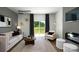 Bright living room features modern fireplace, neutral tones, stylish decor and sliding glass door to outdoor space at 1023 Hostler Ln, York, SC 29745