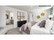 Spacious primary bedroom with plush bedding, decorative gold accents, and a view into the ensuite bath at 1023 Hostler Ln, York, SC 29745