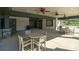 Community outdoor seating area offering shaded tables and chairs by the pool at 1023 Hostler Ln, York, SC 29745